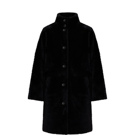 Yves Salomon cacao shearling coat with stand collar, button-front fastening and patch pockets, mid-length silhouette