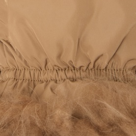 Yves Salomon Faux Fur Shearling Mittens in brown, showing elasticated wrist detail with plush faux fur lining visible beneath smooth outer fabric.
