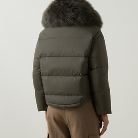 Model wearing Yves Salomon Cropped Down Jacket in Herbal Tea with removable shearling collar, rear view, styled with wide-leg trousers