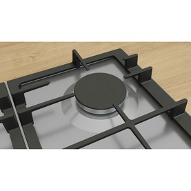 Bosch silver gas hob close-up showing central cast iron burner cap and black pan support grates on stainless steel surface.