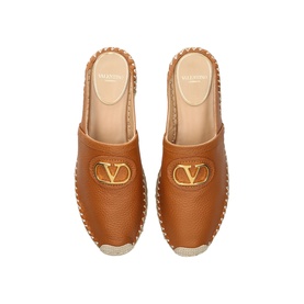 Valentino beige leather espadrille mules with gold VLogo hardware, flat sole and woven jute trim, overhead shot showing both shoes.