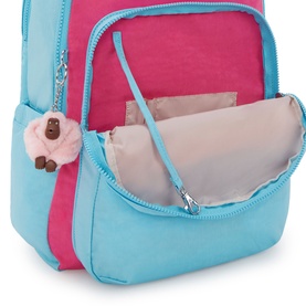 Kipling backpack in Smile Blue Bl and pink, open to show interior compartment with organiser pocket and signature monkey keyring charm.