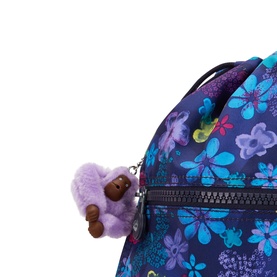 Kipling bag in Dark Flwr Stamp print, close-up of zip detail with signature mini monkey keychain charm in lilac.