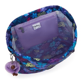 Kipling bag in Dark Flwr Stamp print, open top view showing purple interior lining, zip pockets, and signature monkey keyring charm.