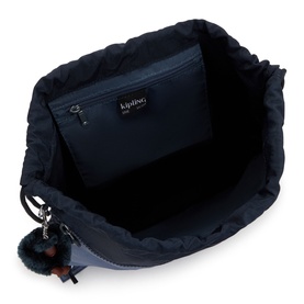 Kipling navy blue bag interior view showing zip pocket, fabric lining, and signature monkey keychain