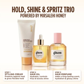 Gisou Hold, Shine & Spritz Trio set featuring Honey Milk Styling Cream, Hair Oil, and Hair Perfume in gold and pink bottles