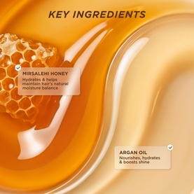 Gisou Honey Infused Vanilla Glaze Hair Perfume key ingredients: Mirsalehi honey and argan oil shown with honeycomb and golden serum texture