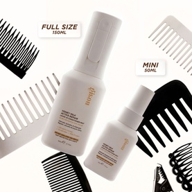 Gisou Honey Milk Active Repair Leave-In Conditioner Mini 50ml alongside full size 150ml bottle, with black combs on white background.