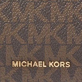 Michael Kors Jet Set Large Logo Wallet in brown/acorn, close-up of signature logo print with gold-toned Michael Kors lettering detail