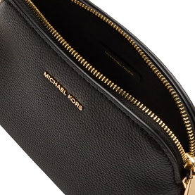 Michael Kors black crossbody bag, pebbled faux leather with gold-tone zip and logo lettering, open view showing interior