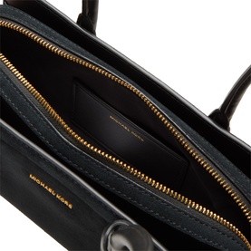 MMK Laila Tote Bag in black, open top view showing gold-toned zip fastenings and interior compartment with logo lining
