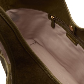 MMK loden suede tote bag interior view showing blush pink lining and gold zip pocket detail