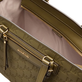 MMK loden green leather tote bag open interior view, pink lining, front zip pocket, gold-tone hardware and MK monogram print
