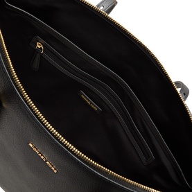 MMK black leather tote bag interior, showing zip-top closure with gold-tone hardware and internal zip pocket