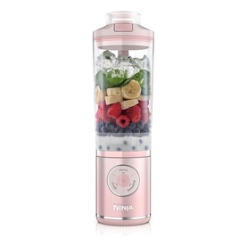 Ninja Blast Max Cordless Portable Blender in pink, filled with fresh fruit including berries and banana, clear cup with pink base