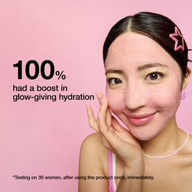 Dr Jart mask efficacy claim: model touching glowing skin with text stating 100% had a boost in glow-giving hydration