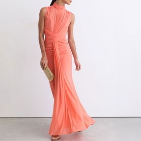 Model wearing Reiss coral orange sleeveless maxi dress with ruched waist detail, styled with a gold clutch bag.