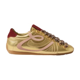 Claude Pierlot metallic gold leather sneakers with pink swoosh detail, burgundy suede heel tab, chain laces, and tan rubber sole