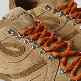 Claude Pierlot women's trainer in tan suede with orange laces and silver eyelets, close-up detail shot