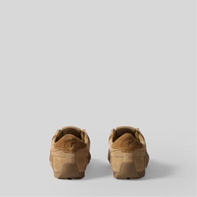 Claude Pierlot women's trainers in clear tan, suede upper, contrast stitching, gum rubber sole, rear view showing heel detail