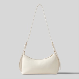 Claude Pierlot shoulder bag in clear white leather, crescent silhouette, gold-tone hardware, single adjustable strap