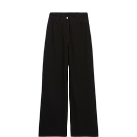 Claude Pierlot wide-leg trousers in black denim with high waist, gold button detail, and full-length cut