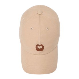 Maje baseball cap in clear beige with brown heart logo embroidery on front panel, curved brim, unstructured crown