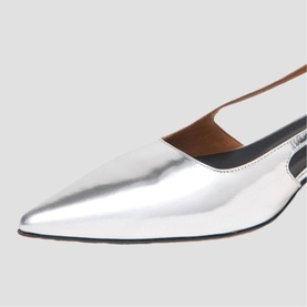 Maje women's pointed-toe slingback heel in silver metallic leather with tan leather insole lining