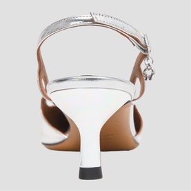 Maje silver slingback heeled sandals with ankle strap, small charm detail, and slender white kitten heel, rear view