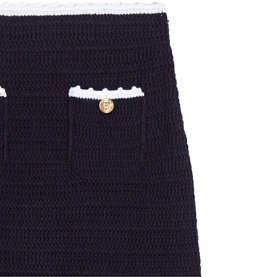 Maje Womens French Dress in navy crochet knit with white trim detail pockets and gold button accent, close-up view