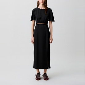 Model wearing Claude Pierlot Lace Slit Dress in black, midi length, short sleeves, satin effect with lace trim detail at waist