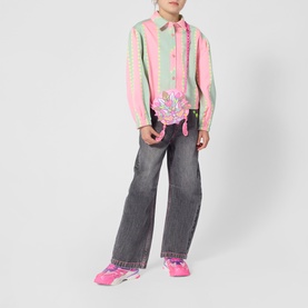 Model with Billy Blush pink accessories bag, styled with striped shirt, grey wide-leg jeans and pink trainers