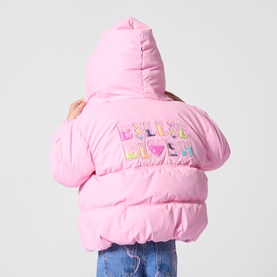 Model wearing Billy Blush coat in Love Potion pink, rear view showing multicolour logo embroidery on back, padded with hood