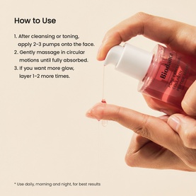 Biodance serum in pink glass bottle being dispensed onto fingertips, with how-to-use application steps shown on white background