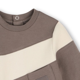 Boss Kids green babygrow with colour-block stripe detail and snap collar, shown as a flat close-up of the chest and shoulder area