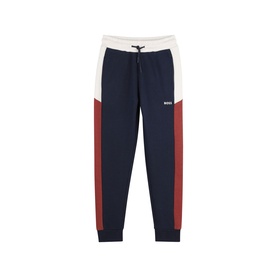 Navy blue colour-block joggers with cream waistband, red side panels, drawstring waist, and ribbed cuffs