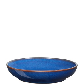 Denby Medium Nesting Bowl in blue glazed stoneware with warm terracotta rim detail, shallow wide form