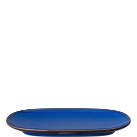 Denby Medium Oblong Platter in blue stoneware with a rich reactive glaze and dark rim detail, oval shape