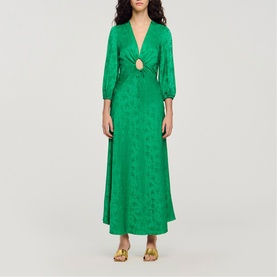 Model wearing Sandro Womens French Dress in green, featuring V-neckline, ring cut-out detail, long sleeves and maxi length.