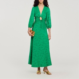 Model wearing Sandro Womens French Dress in green jacquard with cut-out ring detail, styled with gold mules and clutch bag