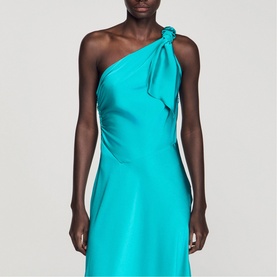 Model wearing Sandro Womens French Dress in green, featuring one-shoulder neckline with knotted detail and floor-length silhouette