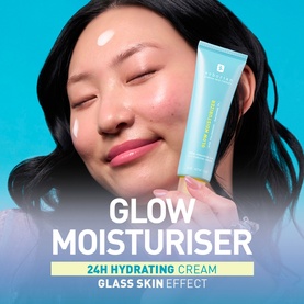 Model with Erborian Glow Moisturiser 24H Hydrating Day Cream tube, applied to skin showing radiant glass skin effect