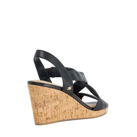 Dune black leather slingback wedge sandal with cork platform sole and gold logo detail, rear view.