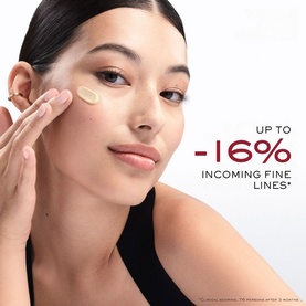 Model wearing Lanc&ocirc;me Absolue Longevity Anticipate Cream applied to cheek, with clinical claim overlay showing up to -16% incoming fine lines