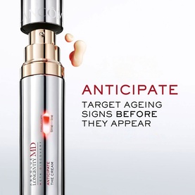 Lanc&ocirc;me Absolue Longevity Anticipate Cream pump bottle with dispensed cream droplets, alongside anti-ageing campaign text