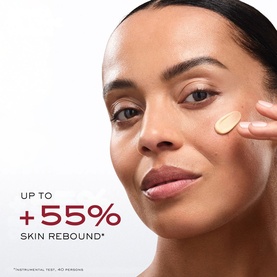 Model with Lanc&ocirc;me Absolue Longevity Reset Cream applied to cheek, with up to +55% skin rebound claim visible
