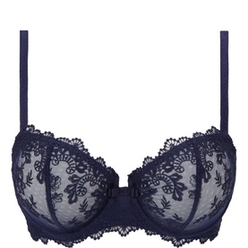 Simone Perele navy balcony bra with floral lace cups and scalloped edges, adjustable straps, and underwire support