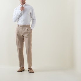 Model wearing Zegna Cashco Casual Shirt in white with semi-spread collar, styled with beige tailored trousers and suede loafers.
