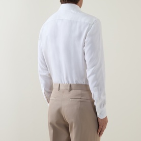 Model wearing Zegna Cashco Casual Shirt in white, back view, styled with beige tailored trousers