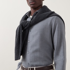 Model wearing Zegna grey cotton-cashmere casual shirt with button placket, styled with a dark charcoal scarf and tan belt.